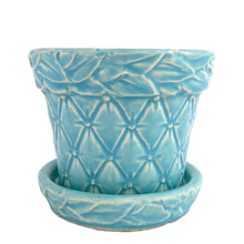 Load image into Gallery viewer, McCoy Tierra Cushion planter, slightly elevated front view emphasizing the quilted diamond lattice pattern and robin's-egg aqua glaze across the body
