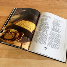 Load image into Gallery viewer, Better Homes and Gardens is known for its fabulous cookbooks. This hardcover cookbook focuses on Meatless Main Dishes inspired recipes. Its 96 pages are filled with amazing  recipes along with many colour photographs. Originally published by Meredith Corporation, USA, 1981. This is the third printing, 1982.   In great vintage condition with normal age-related yellowing.
