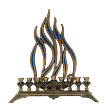 Load image into Gallery viewer, A beautifully crafted vintage brass nine candle Hanukkah menorah with flame motif inset with blue enamel. Made in Israel. A beautiful way to celebrate the Festival of Lights!

In good vintage condition with wear and patina.&nbsp;

Measures 9 5/8 x 2 7/8 x 10 1/2 inches
