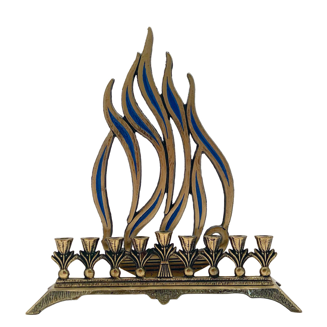 A beautifully crafted vintage brass nine candle Hanukkah menorah with flame motif inset with blue enamel. Made in Israel. A beautiful way to celebrate the Festival of Lights!

In good vintage condition with wear and patina. 

Measures 9 5/8 x 2 7/8 x 10 1/2 inches