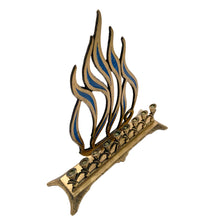 Load image into Gallery viewer, A beautifully crafted vintage brass nine candle Hanukkah menorah with flame motif inset with blue enamel. Made in Israel. A beautiful way to celebrate the Festival of Lights!

In good vintage condition with wear and patina.&nbsp;

Measures 9 5/8 x 2 7/8 x 10 1/2 inches
