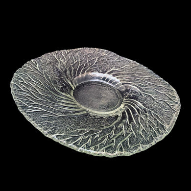 Vintage Metsa Forest clear glass serving plate features a swaying pattern of tree branches. Design by Pertti Kallioinen. Crafted by Lasisepat Mantsala, Finland, circa 1970s. A lovely addition to your Finnish glass collection!  In excellent condition, free from chips.  Measures 11 1/4 inches 