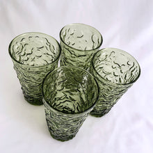 Load image into Gallery viewer, Vintage set of four "Miliano Green" flat glass tumbler with textured surface which makes them incredible easy to hold. Produced by the Anchor Hocking Glass Company, USA between 1960 - 1969. These green glasses bring back all those retro vibes!  In excellent condition, no chips or cracks.  Measures 3 x 5-1/2 inches  Capacity 12 ounces  We have 4 in stock, priced individually.
