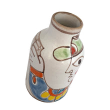 Load image into Gallery viewer, Vintage Giovanni de Simone art pottery bottle featuring a Picasso-like style colourful portrait of a gun-toting military man. Crafted by de Simone Pottery, Italy, 1960s. Highly collectible, this charming piece will make a wonderful addition to your home&#39;s decor and pottery collection!

Excellent condition, no chips, cracks or repairs. Signed on the bottom DESIMONE ITALY with numbers 24 and 205

Measures 3 1/2 x 5 1/2 inches
