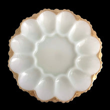Load image into Gallery viewer, This lovely vintage pressed milk glass serving platter features a scalloped rim finished in peach lustre, accommodates 12 deviled eggs, plus the middle is perfect for a small bowl or salt/pepper shakers and the underside has an highly detailed design. Perfect for serving oysters on the half shell with your fave sauce in a small bowl in the middle....just set it on top of a tray or bowl of ice. In excellent condition, no chips. Crafted by Anchor Hocking, USA, circa 1950s. Measures 10 x 1 1/4 inches
