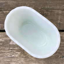 Load image into Gallery viewer, A heavy vintage milk glass vase with a ribbed body and scalloped edge. Crafted by Vase-Mate, circa 1950s.&nbsp;A versatile piece of mid-century glass that could be used as intended, or repurposed as a pen holder, make-up brush holder, candy/nut dish, etc.  In excellent condition, free from chips. Marked &quot;Vase-Mate&quot; and the number &quot;4&quot;.  Measures 6 x 3 7/8 x 4 1/2 inches

