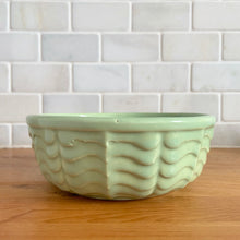 Load image into Gallery viewer, Vintage mint green ceramic mixing bowl 308, with an exterior pattern of horizontal waves. Crafted by Robinson Ransbottom Pottery Co., USA, 1960s. A beautiful piece to add to your art pottery collection!

In excellent condition, no chips/cracks/repairs, manufacturer&#39;s glaze pops. Maker&#39;s marks, number 308.

Measures 6 5/8 x 2 3/8 inches
