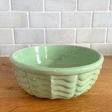 Load image into Gallery viewer, Vintage mint green ceramic mixing bowl 308, with an exterior pattern of horizontal waves. Crafted by Robinson Ransbottom Pottery Co., USA, 1960s. A beautiful piece to add to your art pottery collection!

In excellent condition, no chips/cracks/repairs, manufacturer&#39;s glaze pops. Maker&#39;s marks, number 308.

Measures 6 5/8 x 2 3/8 inches
