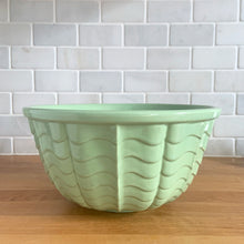 Load image into Gallery viewer, Vintage set of five ceramic nested mixing bowls with an exterior pattern of horizontal waves. Crafted by Robinson Ransbottom Pottery Co., USA, 1960s. A beautiful set to add to your kitchen&#39;s art pottery collection!

Measurements and Condition

No chips/cracks/repairs, wear commensurate with age, manufacturer&#39;s glaze pops and maker&#39;s marks.

Mint Green, 9 1/4 x 4 3/4 inches.

White, 8 1/4 x 4 1/2 inches.

Blue, 7 1/4 x 3 3/4 inches.

Cinnamon, 6 1/4 x 3 inches

Yellow, 5 1/8 x 2 5/8 inches
