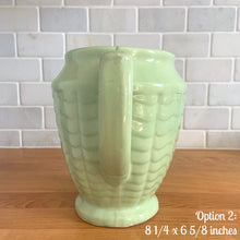 Load image into Gallery viewer, Vintage glossy mint green ceramic pitcher 308 which has an exterior pattern of horizontal waves. Crafted by Robinson Ransbottom Pottery Co., USA, 1930s. A lovely piece to add to your art pottery tableware collection which can be used as intended or fill with flowers!

In as found vintage condition, small chip to the foot, no cracks/repairs. Maker&#39;s marks.

Option 2: measures 8 1/4 x 6 5/8 inches (incl. handle/spout)
