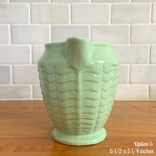 Load image into Gallery viewer, Vintage glossy mint green ceramic pitcher 308 which has an exterior pattern of horizontal waves. Crafted by Robinson Ransbottom Pottery Co., USA, 1930s. A lovely piece to add to your art pottery tableware collection which can be used as intended or fill with flowers!

In as found vintage condition, small chip to the foot, no cracks/repairs. Maker&#39;s marks.

Option 1: measures 6 1/2 x 5 1/4 inches (incl. handle/spout)
