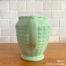 Load image into Gallery viewer, Vintage glossy mint green ceramic pitcher 308 which has an exterior pattern of horizontal waves. Crafted by Robinson Ransbottom Pottery Co., USA, 1930s. A lovely piece to add to your art pottery tableware collection which can be used as intended or fill with flowers!

In as found vintage condition, small chip to the foot, no cracks/repairs. Maker&#39;s marks.

Option 1: measures 6 1/2 x 5 1/4 inches (incl. handle/spout)
