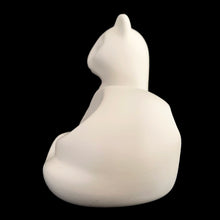 Load image into Gallery viewer, A striking example of vintage MCM craftsmanship, this matte cream art pottery cat embodies the minimalist aesthetic that defined 1960s modernism with its geometric lines and understated elegance. Crafted by the acclaimed Laurentian Pottery studio in Québec, Canada. Its sculptural form and subtle finish have earned it recognition among serious collectors of MCM design and Canadian ceramics, making it a coveted addition to curated collections.

Excellent condition, no chips/cracks/repairs. Original sticker.
