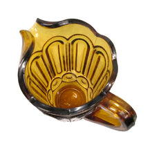 Load image into Gallery viewer, overhead view of LE Smith Moon and Star amber glass pitcher with ice lip, 40 oz vintage pattern glass
