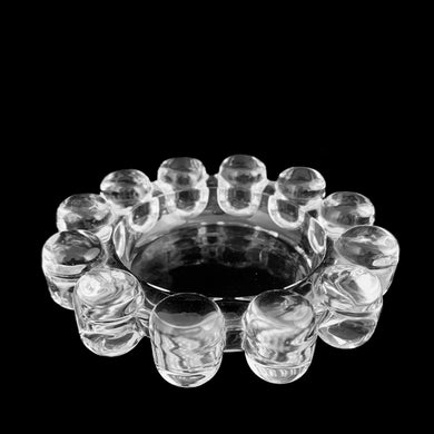 Vintage Morning Sun clear glass pillar candle holder or coaster. Crafted by Mikasa, Japan 1990s. A lovely piece of glass to enhance your home's decor.

In excellent condition, no chips.

Measures 5 1/4 x 1 1/8 inches, fits 2 3/4 inch candle