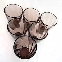 Load image into Gallery viewer, A lovely set of six "Moroccan Amethyst Swirl" glass tumblers. Crafted by the Hazel-Atlas Glass Company, USA, circa 1940-1960s. These glasses feature an optic swirl pattern and are perfect for everyday or any occasion...cheers!  In excellent condition, free from chips, minimal wear.  Measures 3 3/8 x 5 inches  Capacity 12 ounces   
