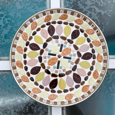 A fabulous vintage mid-century mosaic tile dish featuring acorns and leaves plus various shapes and sizes of tiles in shades of brown, yellow, pink, orange and green...all the colours of autumn. Crafted by Albright Manor, Canada, circa 1960s. The tiles are grouted in white on a gold-toned round metal dish. Perfect as wall art or a dish. A great retro dish to use as a catchall or wall art!   In excellent condition.  Measures 11 3/4 x 1 1/8 inches   