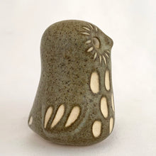 Load image into Gallery viewer, A sweet vintage handmade art pottery owl figurine glazed in moss green with white spots and brown details. Crafted by Strawberry Hill Werkshop, Canada, 1970s. This highly collectible piece is a must-have for any owl collector and is perfect for adding a touch of whimsy to your decor.

Excellent condition, no chips/cracks/repairs. Maker&#39;s mark.

Measures 2 3/8 x 2 x 2 1/2 inches
