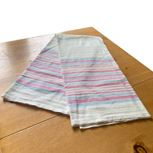 Load image into Gallery viewer, Vintage natural linen tablecloth featuring stripes in light pink, dark pink and blue. Give your table a touch of rustic charm with this grain sack style table covering. Perfect for&nbsp; farmhouse, shabby chic and cottage core decor styles.  In excellent condition, free from stains/tears  Tablecloth measures 59 x 77 inches
