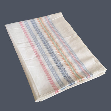 Vintage natural linen tablecloth featuring stripes in pink, blue, orange and green stripes. Give your table a touch of rustic charm with this grain sack style table covering.

New old stock in excellent condition, free from stains/tears. Remnants of a tag indicated it was produced in eastern Europe.

Measures 59 x 82 inches
