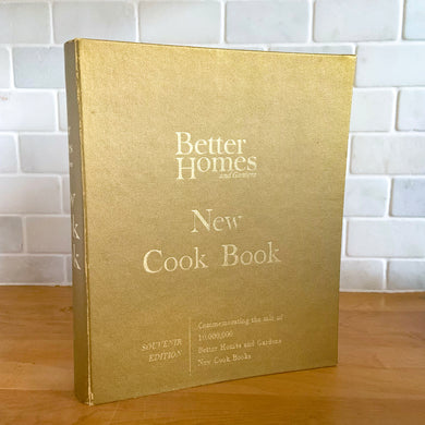 Better Homes and Gardens is known for its fabulous cookbooks and this special edition was produced to commemorate the sale of 10,000,000 BHG cookbooks. Four hundred pages, filled with a variety of inspired recipes, helpful tips and colour photographs are housed in this gold hard cover binder. Published by Meredith Corporation, USA, 1965, sixth printing. Perfect for the budding chef!  In great vintage condition with normal age-related page yellowing. 
