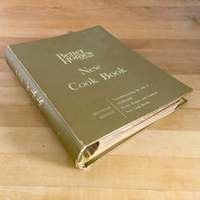Load image into Gallery viewer, Better Homes and Gardens is known for its fabulous cookbooks and this special edition was produced to commemorate the sale of 10,000,000 BHG cookbooks. Four hundred pages, filled with a variety of inspired recipes, helpful tips and colour photographs are housed in this gold hard cover binder. Published by Meredith Corporation, USA, 1965, sixth printing. Perfect for the budding chef!  In great vintage condition with normal age-related page yellowing. 
