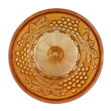 Load image into Gallery viewer, Underside of Northwood Grape &amp; Cable marigold carnival glass butter dish lid, showing full Grape &amp; Cable pattern in relief with central finial base, c. 1910
