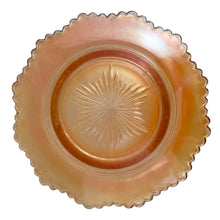Load image into Gallery viewer, Overhead view of Northwood marigold carnival glass butter dish base, showing starburst pressed centre medallion and iridescent amber scalloped rim, c. 1910
