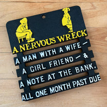 Load image into Gallery viewer, Vintage novelty cast iron trivet depicting a worried man and pregnant woman in yellow with the saying, A Nervous Wreck, A man with a wife, A girl friend, A note at the bank, all one month past due. Use as wall decor or as intended. A fun and practical conversation piece for your cottage or farmhouse kitchen decor!

Measures 4 7/8 x 5 inches
