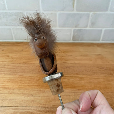 Vintage mid-century era novelty Danish Modern teak optimist character topped  liquor pourer stopper design in the style of Hans Bølling. Designed to fit a standard bottle. The perfect addition to your atomic barware!

In good condition.

Measures 6 inches