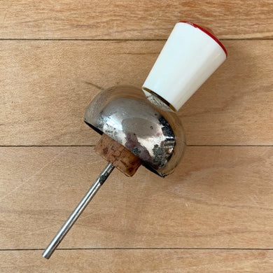 Vintage mid-century era novelty red and white wood topped liquor bottle stopper pourer. Designed to fit a standard bottle. The perfect addition to your atomic barware!

In as found condition.

Measures 4 1/2 inches