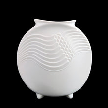 Load image into Gallery viewer, A delicate and elegant art nouveau style white bisque flower vase featuring embossed ocean wave design and glazed on the inside. Impressed &quot;M. Frey&quot; signature and shape number &quot;678&quot;. Crafted by Kaiser, Germany. A lovely vase to fill with a sweet bouquet of fresh or dried flowers In excellent condition, free from chips/cracks/repairs. Measures 4 x 4 inches
