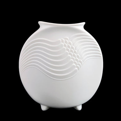 A delicate and elegant art nouveau style white bisque flower vase featuring embossed ocean wave design and glazed on the inside. Impressed 