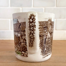 Load image into Gallery viewer, Johnson Bros Old English Countryside mug, handle view showing open thatched village cottages in brown transferware and flowers on the handle
