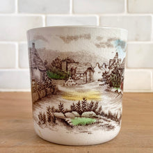 Load image into Gallery viewer, Johnson Bros Old English Countryside mug, handleless side view showing open countryside scene with pond, trees, and thatched village cottages in brown transferware
