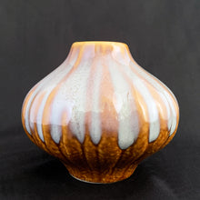 Load image into Gallery viewer, Very cool vintage bulb-shaped bud vase with really nicely done drip glaze. The main colour is a mustard with a cream drip glaze over the top, with hints of purple. Would look great in any room. Perfect for a little floral arrangement, or repurpose as a pen/toothbrush/make-up brush holder.  Circa 1970. Likely made in West Germany.  In excellent condition, no chips, cracks or repairs.  Measures 4 x 3 1/2 inches
