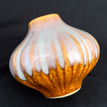 Load image into Gallery viewer, Very cool vintage bulb-shaped bud vase with really nicely done drip glaze. The main colour is a mustard with a cream drip glaze over the top, with hints of purple. Would look great in any room. Perfect for a little floral arrangement, or repurpose as a pen/toothbrush/make-up brush holder.  Circa 1970. Likely made in West Germany.  In excellent condition, no chips, cracks or repairs.  Measures 4 x 3 1/2 inches
