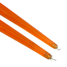 Load image into Gallery viewer, Pair of vintage mid-century orange lucite taper candles showing flameless candles wicks
