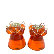 Load image into Gallery viewer, Pair of vintage mid-century orange lucite candle holders with silver-toned WT Rogers Lustro-Magic wire bases with crimped rims
