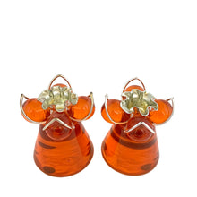Load image into Gallery viewer, Pair of vintage mid-century orange lucite candle holders with silver-toned WT Rogers Lustro-Magic wire bases with crimped rims
