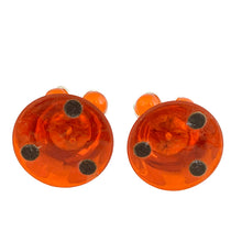 Load image into Gallery viewer, Base view of pair of vintage mid-century orange lucite candle holders
