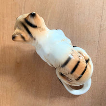 Load image into Gallery viewer, Delightful vintage orange tabby cat porcelain figurine Giftcraft, Japan. Add this sweet figurine to your collection!

In excellent condition, no chips/cracks. Sticker present.

Measures 3 7/8 x 1 1/2 x 2 1/4 inches
