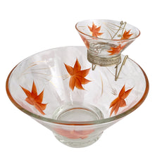 Load image into Gallery viewer, Vintage Anchor Hocking Enchantware 3-piece chip and dip set assembled on metal bracket, showing large clear glass chip bowl and small dip bowl with hand-painted orange maple leaf and gold stem pattern, USA, 1950s
