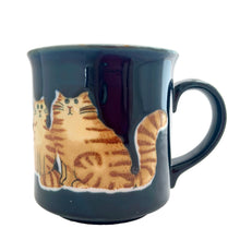 Load image into Gallery viewer, Vintage cobalt blue ceramic mug featuring a sweet orange tabby cat family. Crafted by Otagiri, Japan, 1970s. A cute mug to add to your collection.

In excellent condition, no chips or cracks.

Measures&nbsp;4 3/4 x 3 1/2 x 3 5/8 inches

Capacity 10 ounces

