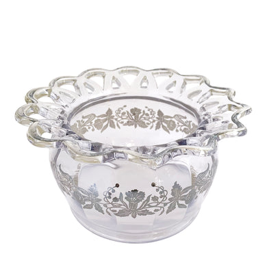 Vintage clear laced edge pressed glass rose bowl featuring a band of silver overlay daffodils. The glass is attributed to Co-Operative Flint Glass and the silver overlay to Silver City, USA, circa 1940s/50s. Pair this beauty with a flower frog for a stunning floral display! In excellent condition, free from chips. Silver overlay is intact. Measures 7 1/2 x 4 1/8 inches Opening measures 4 1/2 inches