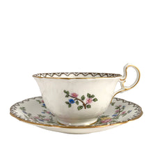 Load image into Gallery viewer, Vintage Pagoda Chinoiserie motif fine bone china teacup and saucer featuring hand painted brown pagoda and flowers in shades of pink, blue, yellow and green with gold gilt trim and scalloped edges. Crafted by Aynsley, England, 1920s. A lovely way to enjoy a cuppa tea!

In excellent condition, no chips, cracks or repairs. Maker&#39;s mark on the bottom.

Measures 3 1/2 x 2 1/4 inches | Saucer measures 5 1/2 inches
