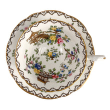 Load image into Gallery viewer, Vintage Pagoda Chinoiserie motif fine bone china teacup and saucer featuring hand painted brown pagoda and flowers in shades of pink, blue, yellow and green with gold gilt trim and scalloped edges. Crafted by Aynsley, England, 1920s. A lovely way to enjoy a cuppa tea!

In excellent condition, no chips, cracks or repairs. Maker&#39;s mark on the bottom.

Measures 3 1/2 x 2 1/4 inches | Saucer measures 5 1/2 inches
