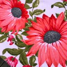 Load image into Gallery viewer, A vintage pale salmon pink ultra soft cotton terry cloth bath towels featuring a striking spray of flowers in shades of salmon, charcoal and green with an inset scalloped border pattern. Crafted by Besana, Italy. This gorgeous towel is sure to amplify your bath!  In excellent condition, free form tears/stains. Possibly new old stock.  Measures 47 inches x 27 1/2 inches
