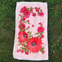 Load image into Gallery viewer, A vintage pale salmon pink ultra soft cotton terry cloth bath towels featuring a striking spray of flowers in shades of salmon, charcoal and green with an inset scalloped border pattern. Crafted by Besana, Italy. This gorgeous towel is sure to amplify your bath!  In excellent condition, free form tears/stains. Possibly new old stock.  Measures 47 inches x 27 1/2 inches
