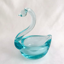 Load image into Gallery viewer, This lovely hand blown art glass swan trinket dish is a lovely shade of pale turquoise blue with a nicely polished bottom. This graceful swan was crafted by the artisans of Murano, Italy, circa 1960/70s. It&#39;s perfect to hold jewellery or display as home decor. Also makes a perfect gift!  In excellent condition, free from chips/cracks/repairs.  Measures 3 1/2 x 2 5/8 x 4 1/2 inches
